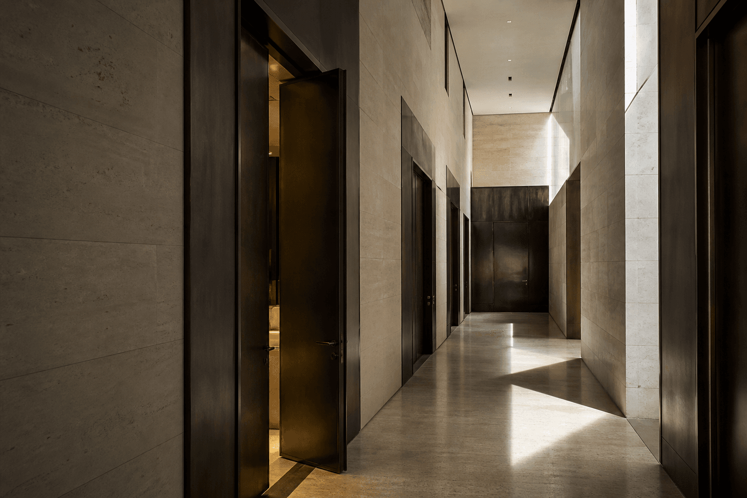 Limestone corridor and bronze doors in a private bank